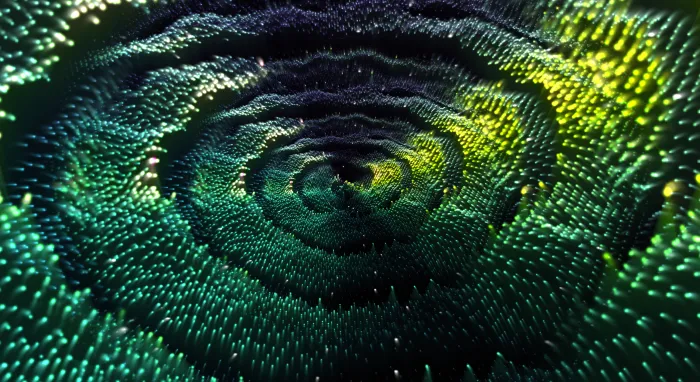A jade-green basin of glowing beads spiraling down like water circling a drain