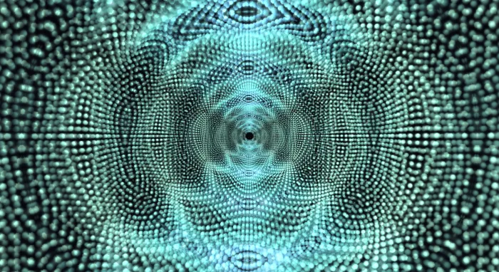 A vast symmetric cathedral of teal particles arching toward a glowing center